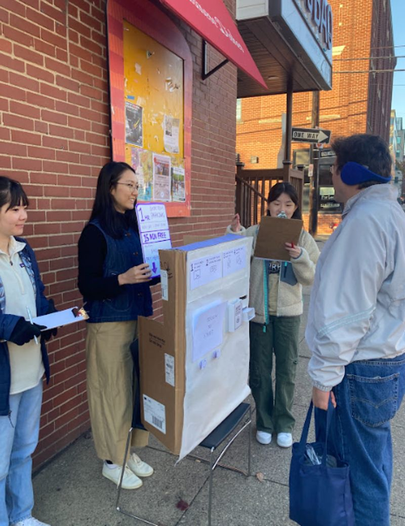 Testing physical kiosk prototype with drivers on the street